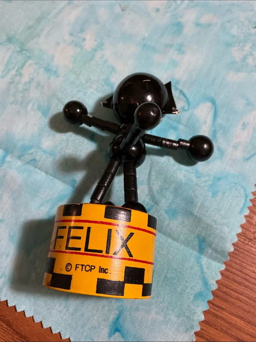 Vintage Felix the Cat wooden push puppet manufactured by FTCP,Inc